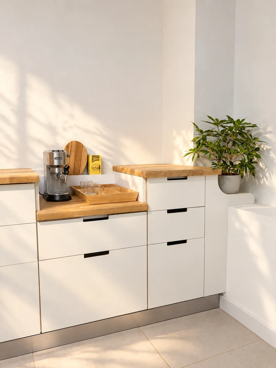 Close-up of the coffee station: lowered oak worktop and drawers with routed handles